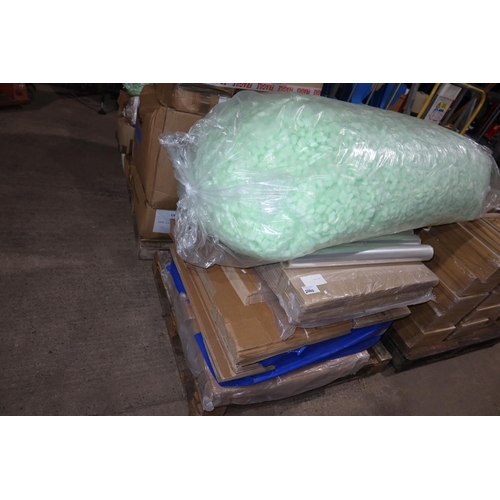 2060 - A quantity of various packaging materials, large bag of polystyrene peanuts, boxes, etc. Contents of... 