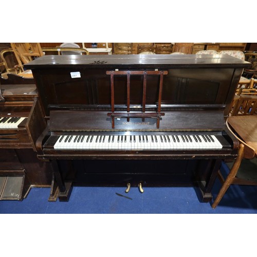 3560 - An Edwardian carved mahogany cased harmonium by the Estey Organ Company