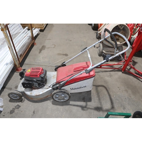 560 - 1 Mountfield petrol engine lawn mower with a Honda petrol engine