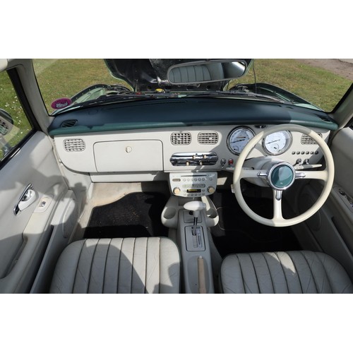 544a - Nissan Figaro coupe convertible.  Reg. no. J496 NPR, 1st reg 05/04/2005, declared manufactured 1991,... 