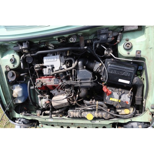 544a - Nissan Figaro coupe convertible.  Reg. no. J496 NPR, 1st reg 05/04/2005, declared manufactured 1991,... 