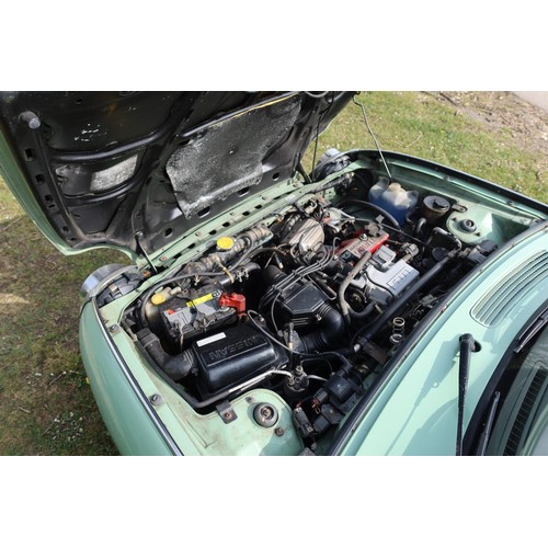 544a - Nissan Figaro coupe convertible.  Reg. no. J496 NPR, 1st reg 05/04/2005, declared manufactured 1991,... 