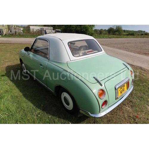 544a - Nissan Figaro coupe convertible.  Reg. no. J496 NPR, 1st reg 05/04/2005, declared manufactured 1991,... 