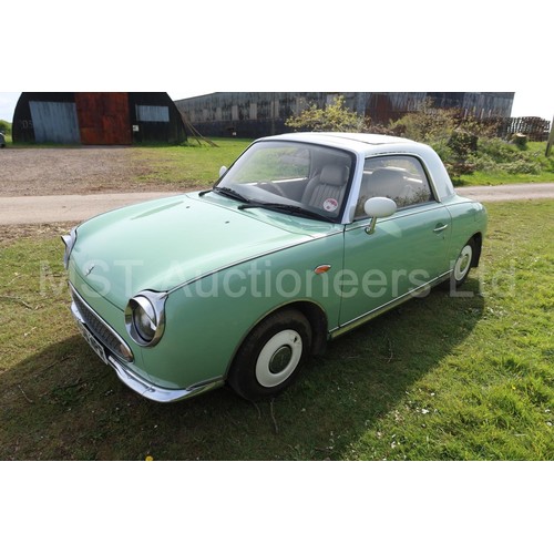 544a - Nissan Figaro coupe convertible.  Reg. no. J496 NPR, 1st reg 05/04/2005, declared manufactured 1991,... 