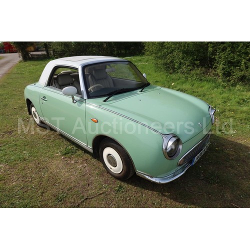 544a - Nissan Figaro coupe convertible.  Reg. no. J496 NPR, 1st reg 05/04/2005, declared manufactured 1991,... 