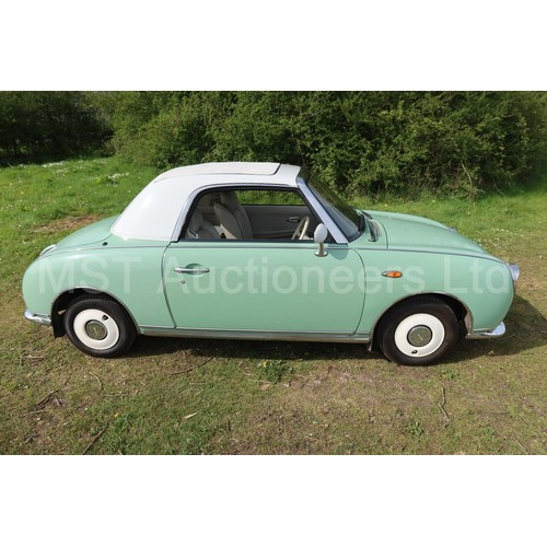 544a - Nissan Figaro coupe convertible.  Reg. no. J496 NPR, 1st reg 05/04/2005, declared manufactured 1991,... 