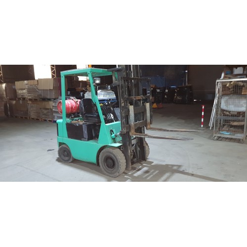 545A - 1 gas powered forklift by Mitsubishi model FG15, serial number F25-53532, capacity approx 1500kg, 10... 