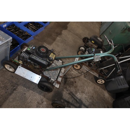 74 - 3 homemade lawnmowers each fitted with a pull start petrol engine and a quantity of various grass co... 