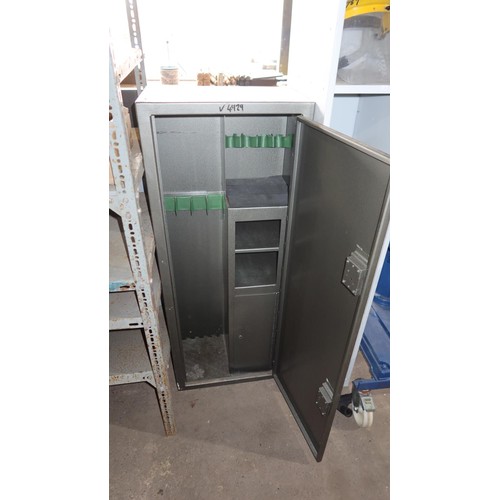 152 - A metal twin lock gun cabinet supplied with two sets of keys approx 51 x 31 x 127cm high. Cabinet in... 