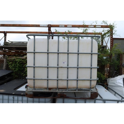 894 - 1 plastic IBC tank in a cage