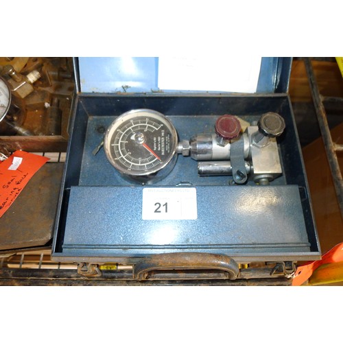 21 - A Dunedin 1960s injector test set, a Sykes-Pickavant clutch alignment tool, a vintage diesel compres... 