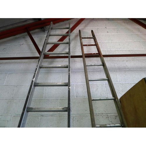 63 - 1 aluminum ladder (15 rung) and 1 other ladder