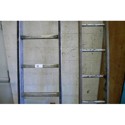 63 - 1 aluminum ladder (15 rung) and 1 other ladder