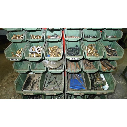 76 - A double sided mobile storage trolley with a quantity of Lin type bins containing cap head screws, s... 