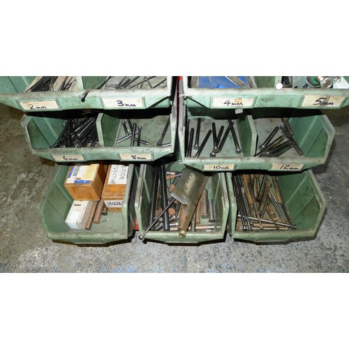 76 - A double sided mobile storage trolley with a quantity of Lin type bins containing cap head screws, s... 