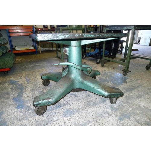 80 - 1 adjustable height engineers surface table approx 76 x 60cm on a heavy duty wheeled cast base