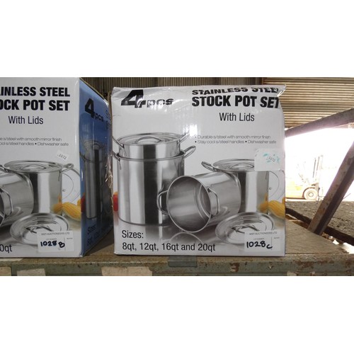 1028C - A 4 piece stainless steel stock pot set with lids