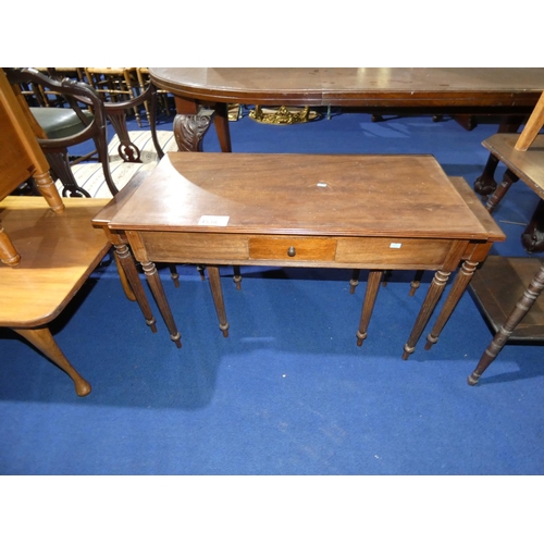 4538 - A nest of three reproduction mahogany rectangular topped coffee tables on fluted legs