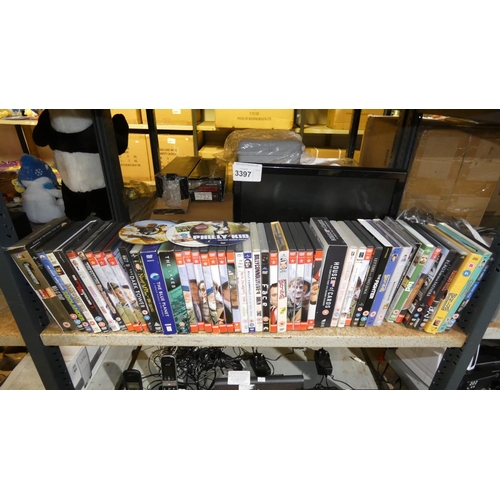 3397 - A Ferguson 18 inch HD DVD TV and a quantity of various DVDs contents of 1 shelf - trade