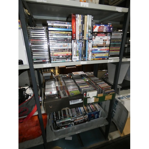 3408 - A large quantity of various DVD films and music CDs, contents of 3 shelves