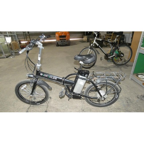 3110 - 1 folding electric bike/ebike/bicycle by Byo-cycles supplied with a mains charger, working when test... 