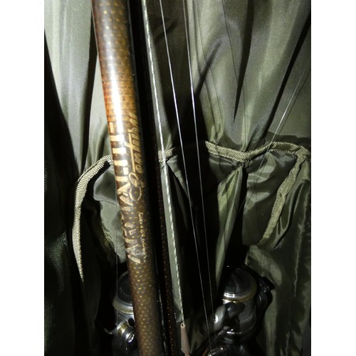 3038 - A Nash Hi-Gun rod holdall containing 3 x Armalite Century fishing rods and 3 x Okuma Power-Liner ree... 