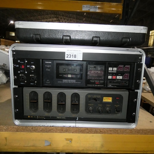 2318 - 1 x Toshiba PC-V10 stereo cassette deck and 1 x TOA PA amplifier - both items are supplied in a rack... 