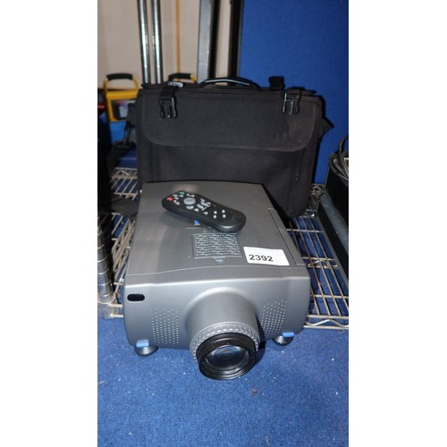 2392 - 1 Tatung LCD projector type TLP-2200 supplied with a lens, a soft black case and a remote control (T... 