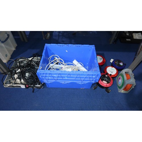 2420 - A quantity of various power leads, plug boards and 5 extension leads. The blue plastic crate is not ... 