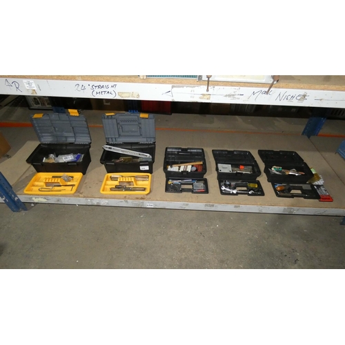 304 - 5 black plastic tool boxes containing a quantity of various hand tools including files, spanners, Al... 