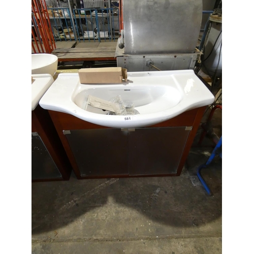 581 - 1 vanity unit with a white ceramic basin approx 92cm wide supplied with a waste and leg pack