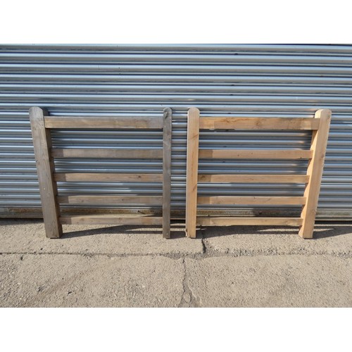 742 - 2 x wooden gates both approx 120cm / 4ft wide - Damage to 1 upright and both have no brace rails