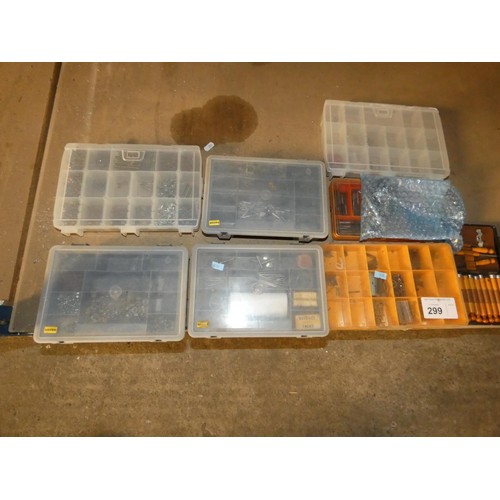 299 - A quantity of various model engineering items including small nuts / bolts, drill bits, files, a mod... 