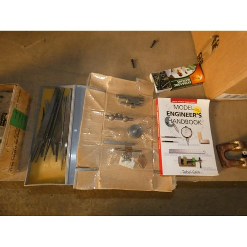 299 - A quantity of various model engineering items including small nuts / bolts, drill bits, files, a mod... 