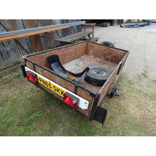 658 - A single axle un-braked braked tailer body size approx 201 x 123cm and side are 43cm high. A wheel b... 