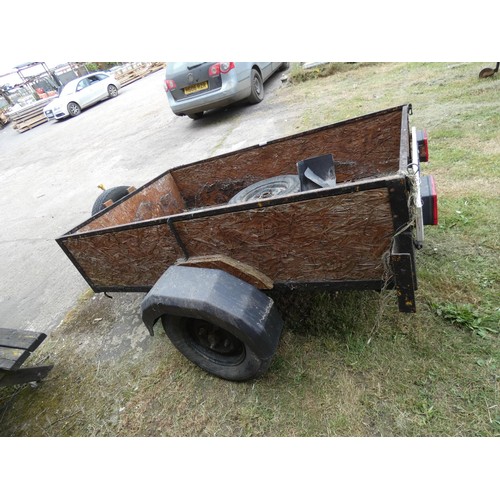 658 - A single axle un-braked braked tailer body size approx 201 x 123cm and side are 43cm high. A wheel b... 