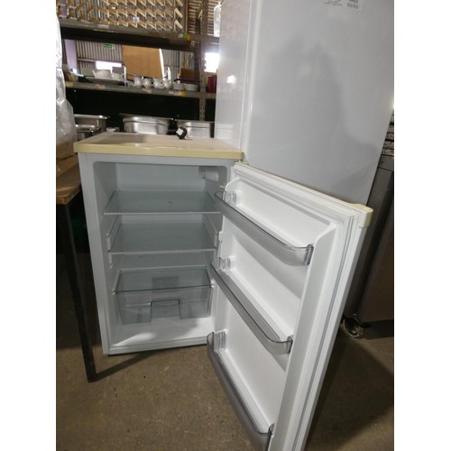 1075 - An under counter fridge and a 3/4 height fridge both by Curry's essentials - trade