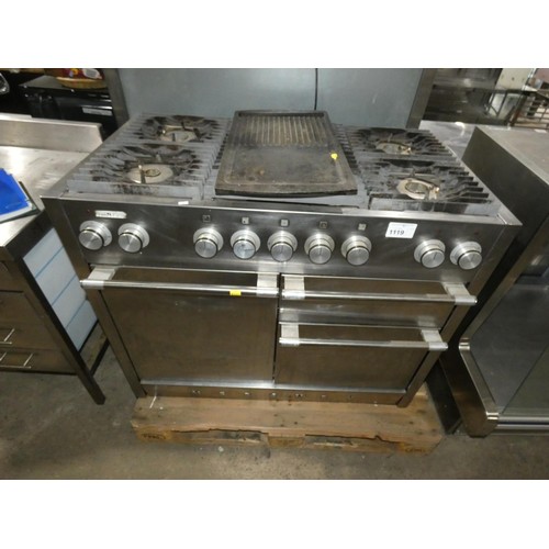 1119 - A commercial stainless steel dual fuel gas fired 5 burner range with 3 fold down doors (2 x oven 1 g... 