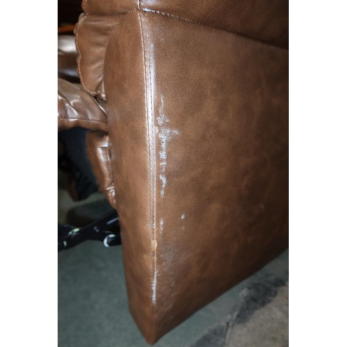 2074 - A brown upholstered manually reclining arm chair