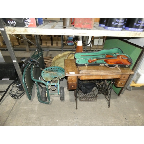 2090 - A quantity of various items including a vintage Singer sewing machine 240v with table, a violin, a s... 