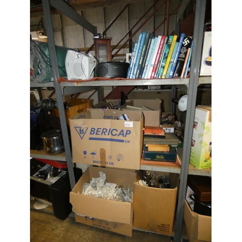 2115 - A quantity of various items including books, a heater 240v, crockery, games, glassware etc. Contents... 