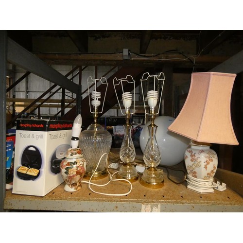 2116 - A quantity of various items including table lamps 240v, a Revlon Pediprep spa, a toaster 240v, a Sod... 