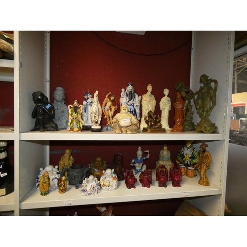 3001 - A quantity of decorative, mainly oriental style ceramic, resin and other figures (2 shelves)