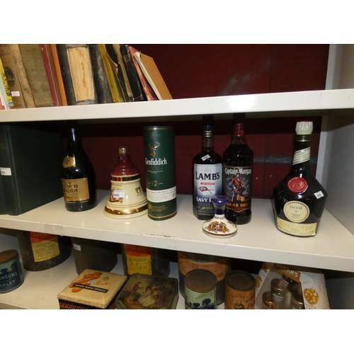 3006 - 1 bottle of French brandy, 2 two bottles of whisky, 2 and 1 small bottle of rum and 1 bottle of bene... 