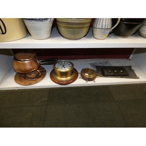 3018 - A brass cased naval clock, a copper fondue set and various other items (one shelf)