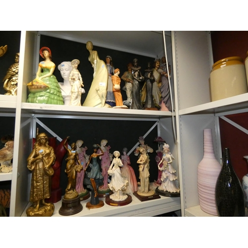 3029 - A collection of tall resin and ceramic figures (2 shelves)