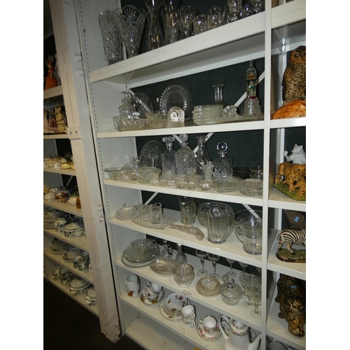 3035 - A large quantity of miscellaneous decorative glassware & a small quantity of chinaware (6 shelves)