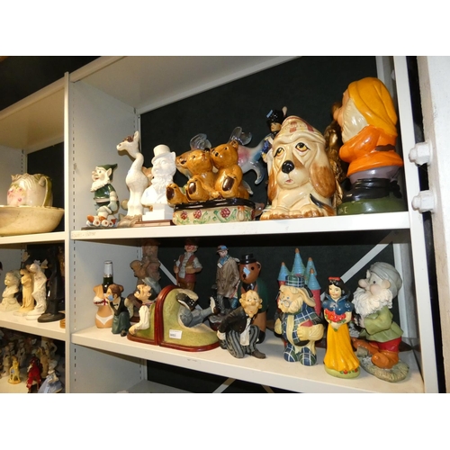 3053 - A quantity of miscellaneous decorative resin and ceramic caricature figures (2 shelves)