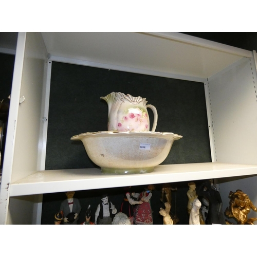 3056 - A Victorian floral patterned jug and basin set