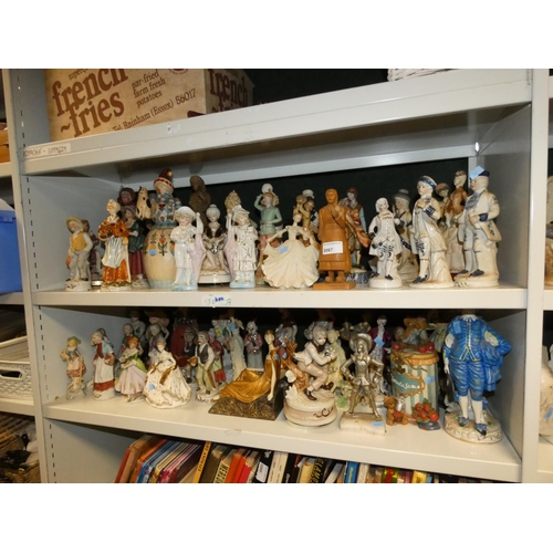 3067 - A quantity of miscellaneous decorative resin, ceramic and other figures (2 shelves)